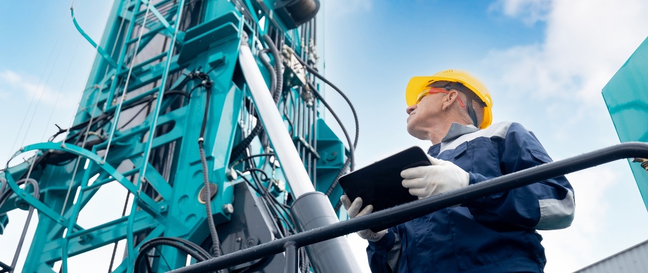 A drilling rig working